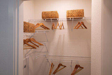 empty closet with elegant wood hangers