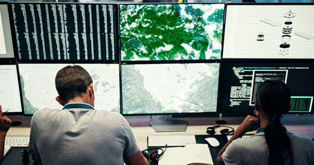 Screen, people and meteorology with monitor for weather, satellite maps and team to track storm....
