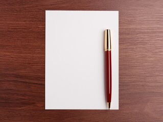 Elegant Writing Setup with Blank Paper and Red Pen on Wooden Table