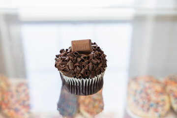 Decadent Chocolate Cupcake with Hershey’s Topping – Gourmet Dessert Photography for Bakery, Food Marketing, and Stock Use