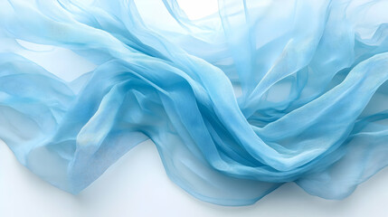Obraz premium Flowing light blue silk fabric on white