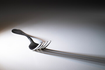 Fork on a White Background with a Beautiful Shadow
