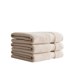 A stack of folded towels in neutral colors, fluffy texture
