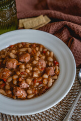 homemade recipe of bean stew with meat, a healthy dish for a home table.