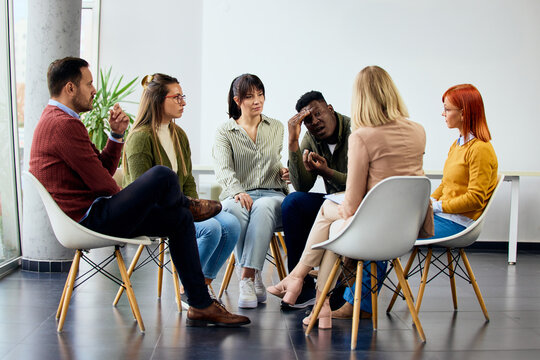 Diverse Group Sharing Experiences in Support Workshop for Emotional Wellbeing