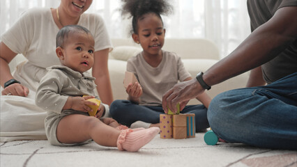 Parents and children relax during their holiday at home