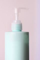 A close-up shot of a bottle of lotion sitting on a table, ready for use.