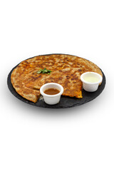 Delicious Indian Paratha with Various Condiments on a Plate