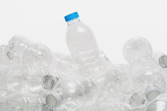 Pile of plastic bottles for recycling, clipping path, white background