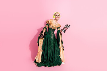 Blending classical medieval attire with modern accessories in a vibrant setting