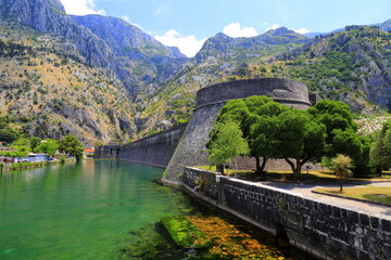 Fototapeta premium Old medieval fortifications of Kotor, Montenegro - city walls, towers, bastions, forts, castle. Military architecture in Kotor, Montenegro