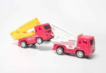 Toy tow truck pulling a truck