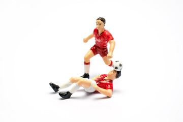 Football player toy, playing football © Studio 11
