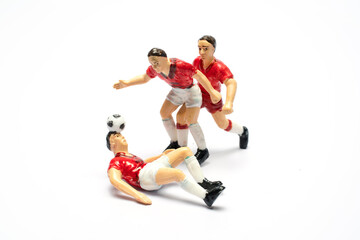 Football player toy, playing football