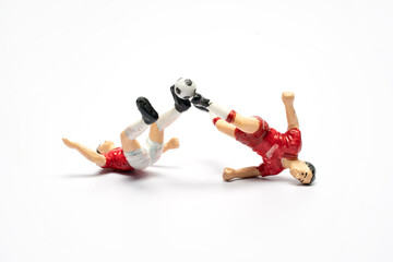 Football player toy, playing football