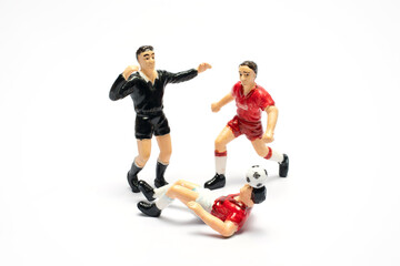 Football player toy, playing football