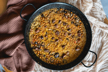 homemade recipe of rice in paella with mushrooms and meat