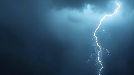 Dramatic lightning strikes illuminate dark stormy sky, creating powerful atmosphere