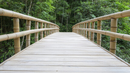 Obraz premium serene bamboo bridge surrounded by lush greenery, inviting exploration and tranquility