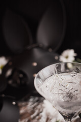 Elegant Crystal Glass with Sparkling Drink in a Mysterious Setting