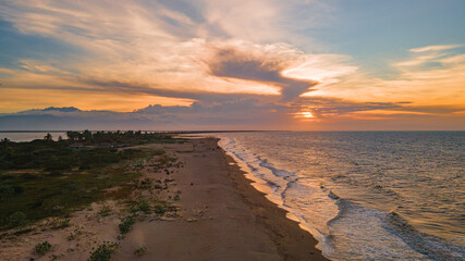 Breathtaking Sunset Over the Beach in La Guajira, Colombia - A Perfect Vacation Retreat