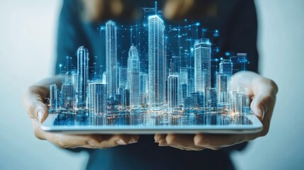 A person holding a tablet displaying a futuristic city skyline with digital elements and data overlay