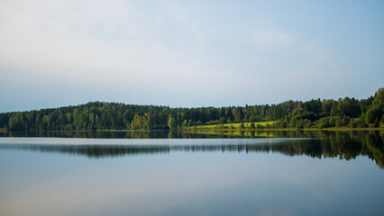 beautiful reflection of the forest in the lake