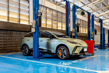 Modern Electric Car in Auto Repair Workshop