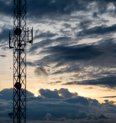 high voltage tower at sunset