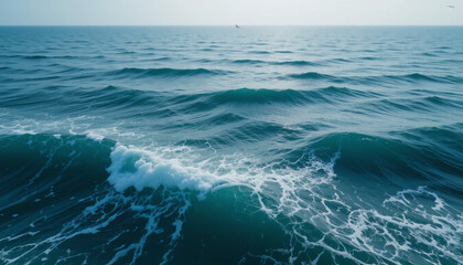 Fototapeta premium Vast Ocean Waves. Serene Seascape with Rolling Waves and a Lone Bird in the Horizon.