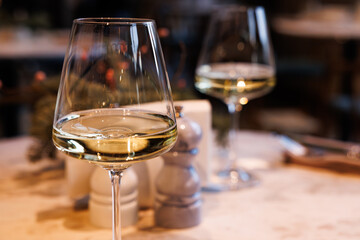 Elegant setting with wine glasses ready for a delightful dining experience at a cozy restaurant