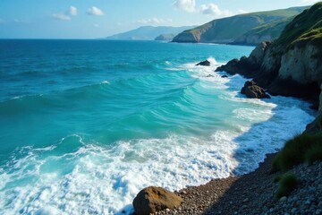 Obraz premium Deep blue ocean waves gently lapping at the shore of a secluded cove, ocean, cove, wave