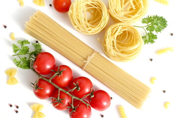 On a white background lies nest pasta and straight tied spaghetti.