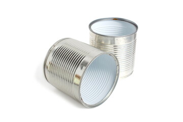 On a white background there are two empty containers from canned food.