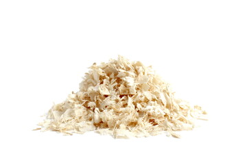 A pile of fresh wood sawdust lies on a white background.