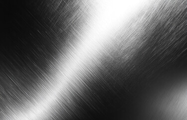 Brushed metal surface with light reflection and visible scratches and diagonal lines texture pattern