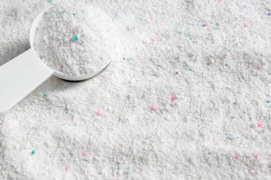Washing powder with a special spoon.