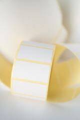 Rolls of white labels isolated. Labels for direct thermal or thermal transfer printing. Blank sticky label roll for thermal transfer printing price criss.	