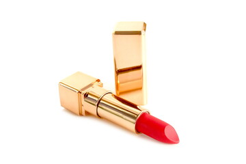 There is red lipstick on a white background.	