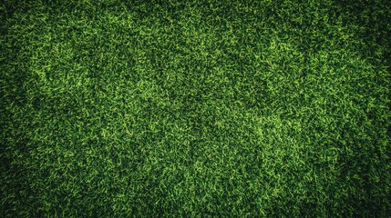 Fototapeta premium Vibrant Green Turf Surface. Textured Faux Grass for Recreational Spaces and Sports Courts