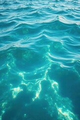 Fototapeta premium Sparkling clear water with circular waves in a serene ocean setting, serenity, waves
