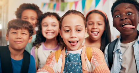 Selfie, happy and portrait of children in classroom for language development, learning or growth. Goofy, kids and cute students with photography picture for lesson with education at elementary school