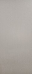 A minimalist light gray textured background with a subtle fabric pattern. Perfect for use in graphic design, web design, packaging, advertising materials, mockups, and interior solutions
