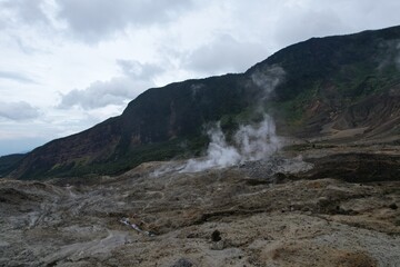 The drone view of Papandayan Mountain in Garut Regency, West Java, Indonesia. It was taken on January 14 2025 by a professional. It's an iconic mountain in this regency
