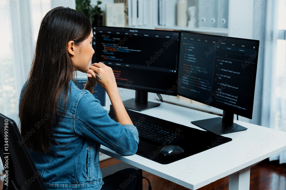 Poster young asian it developer looking online information on pc for beautiful pose with coding program dat