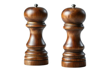 A pair of crafted wooden spice grinders stand ready to season culinary creations presented against a stark black backdrop enhancing grain detail.