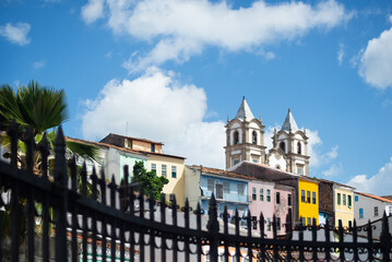 View of the facade of colonial houses and a church in Pelourinho, historic center of the city of...