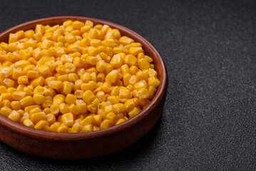 Sweet yellow canned corn in bowl