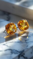 Citrine diamond earrings gleaming atop polished marble, catching light with sophisticated radiance and luxe jewelry craftsmanship