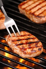 Grilled pork chops on a barbecue